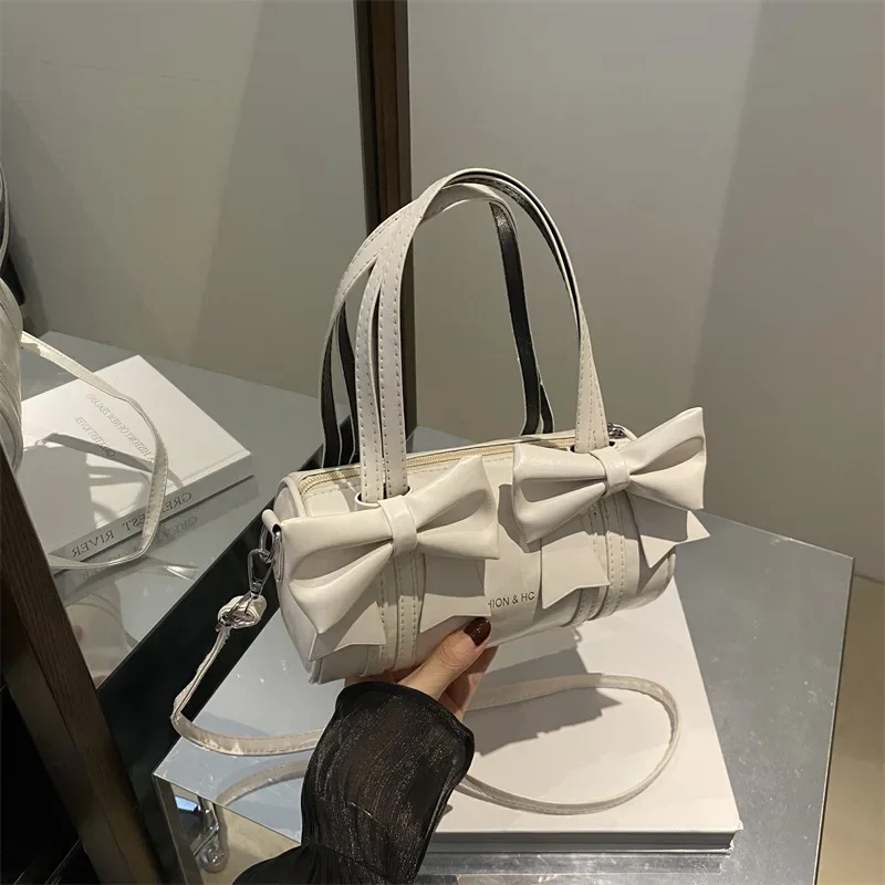 

Bow bag One shoulder armpit bag Crossbody portable cylinder bag