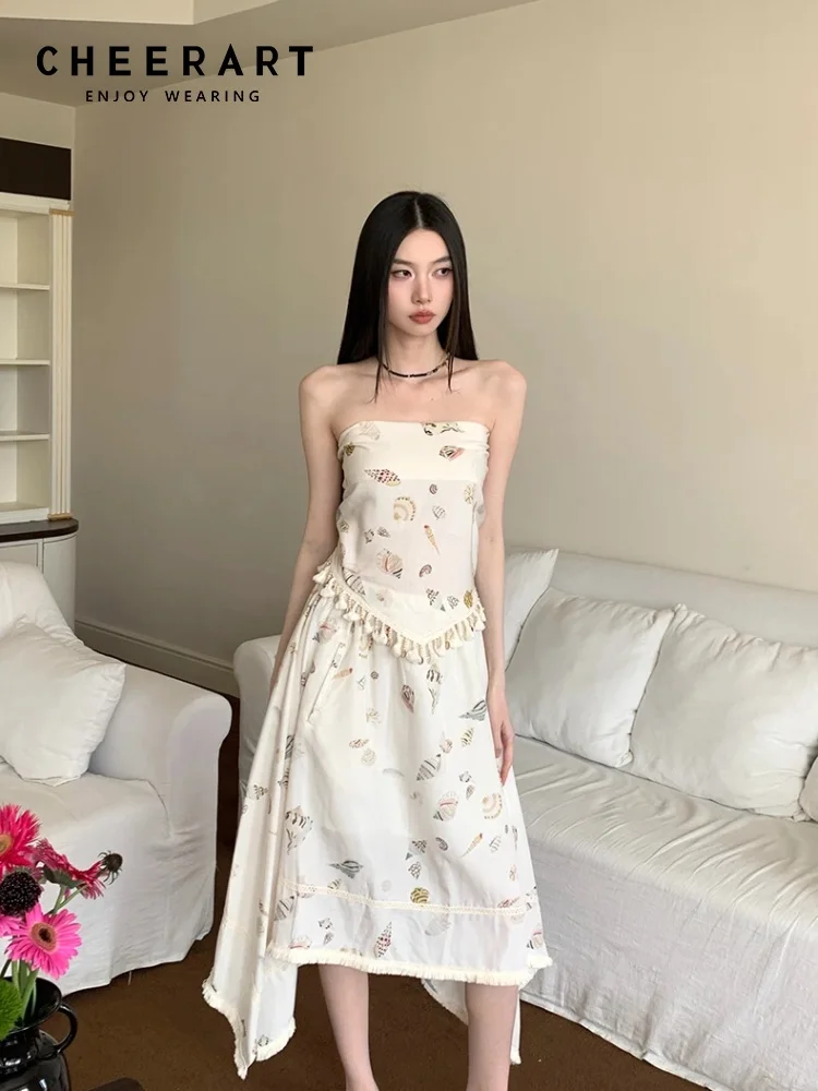 

CHEERART Ocean Seashell Отпуск Летний наряд Комплект из 2 предметов для женщин Топ и юбка с кисточками Комплект пляжного праздничного наряда 2025