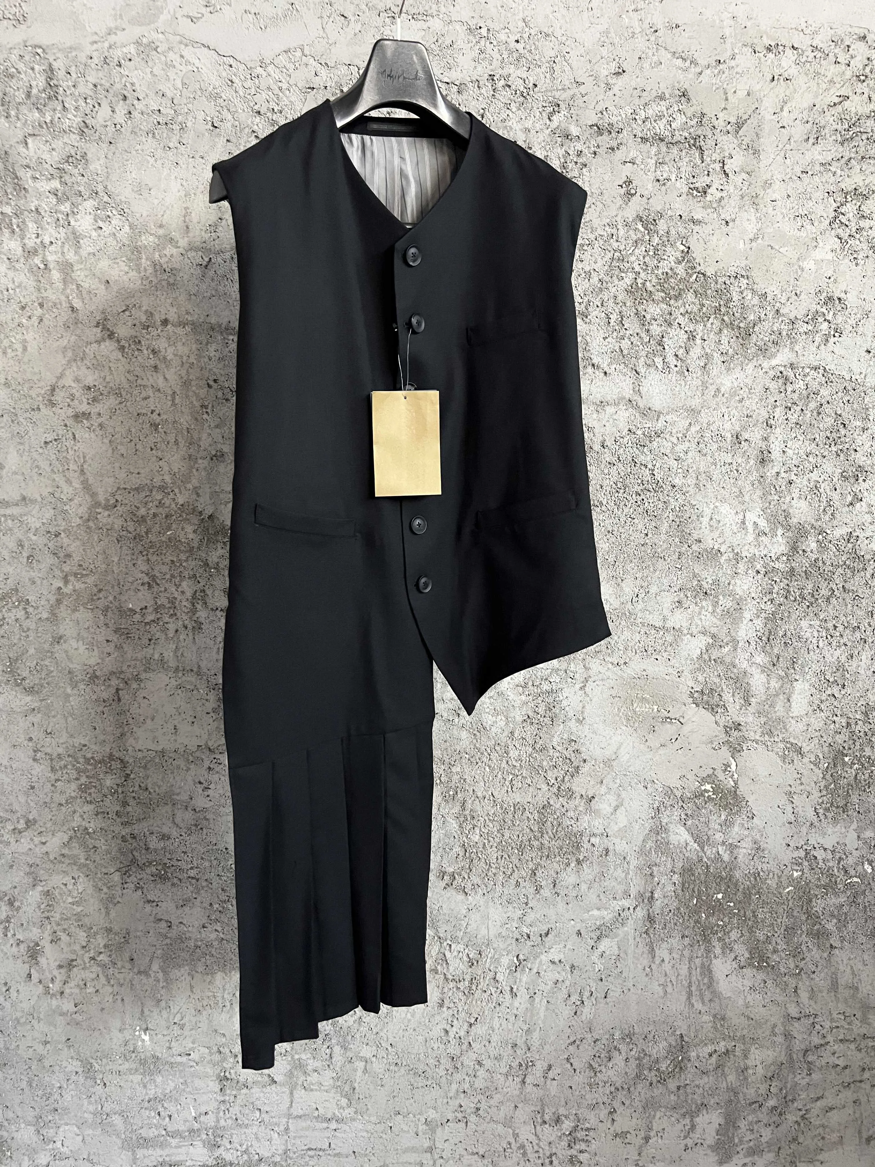 The waistcoat, tailcoat, asymmetrical pleated wool, gabard, waistcoat, sleeveless, niche
