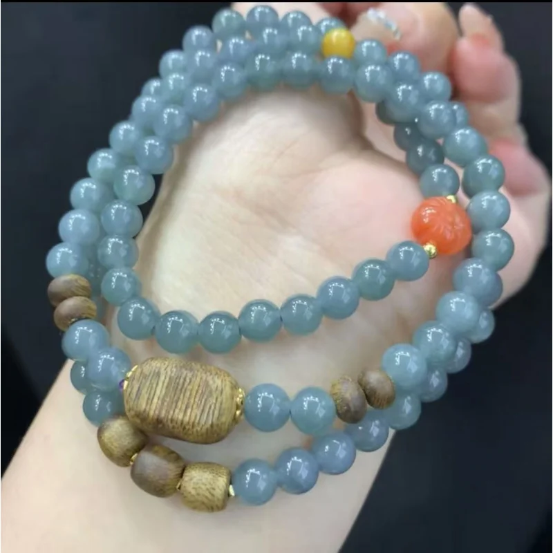 Natural Jadeite A-grade design three-strand bracelet paired with Red