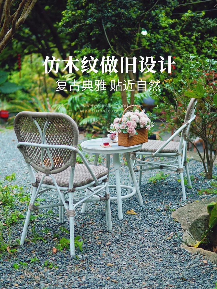 Three piece rattan chair set, rattan woven table and chair combination, outdoor outdoor tea table in homestay garden