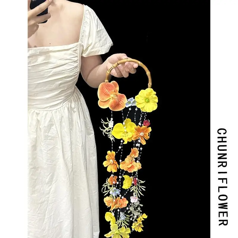 

Dopamine color waterfall hand flower simulation bridal bouquet wedding dress shooting hand bouquet photo