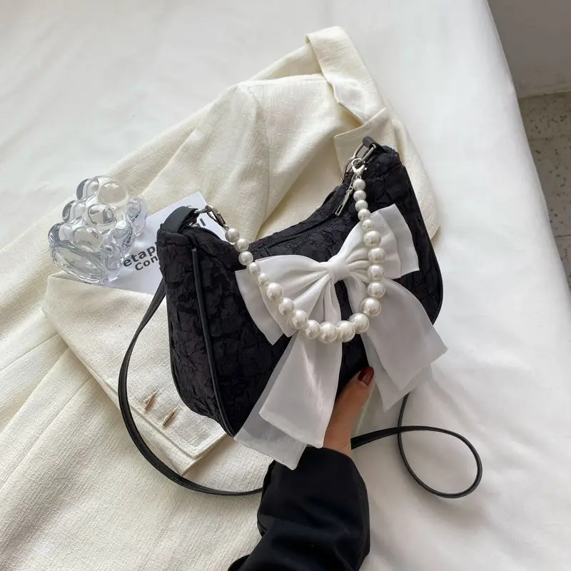 

Женская сумка Элегантный бант Кружева с жемчугом и бисером Шикарная сумка на плечо Простая сумка подмышками Нишевая сумка с бантом Роскошная женская сумка через плечо