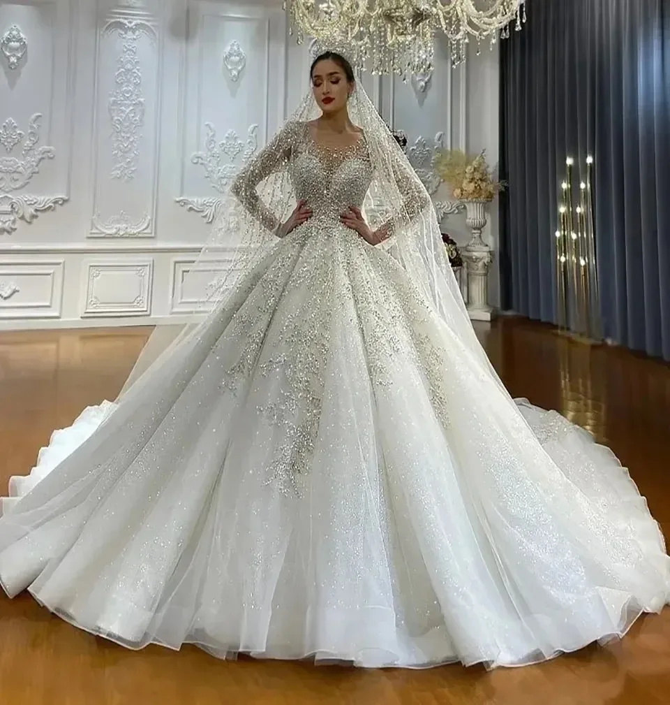 

2026 Luxurious Arabic Dubai Long Sleeves Wedding Dress Vestidos De Novi Pearls Beading Brides Dress Scoop Neck Ball Gowns Custom