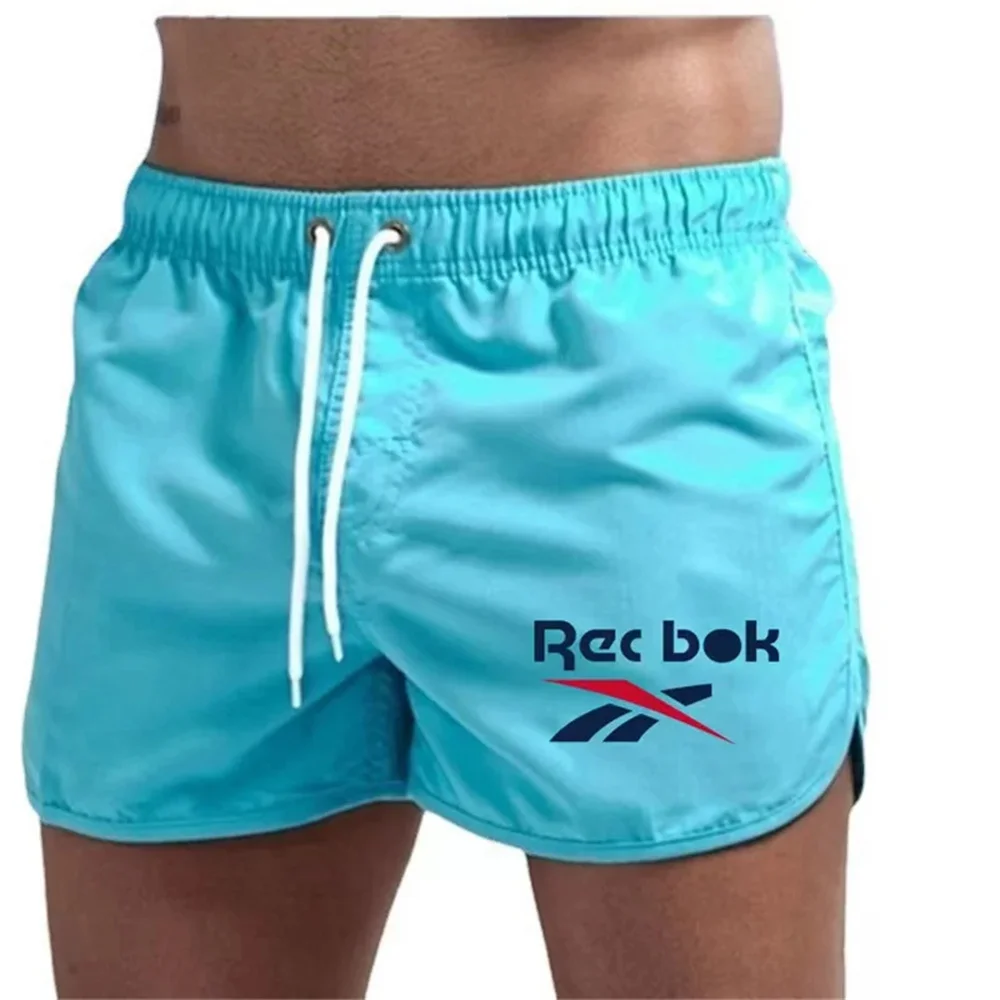 Summer fashion casual breathable quick drying ultra-thin best-selling beach shorts Men\'s swimming shorts + men\'s sports gym spor