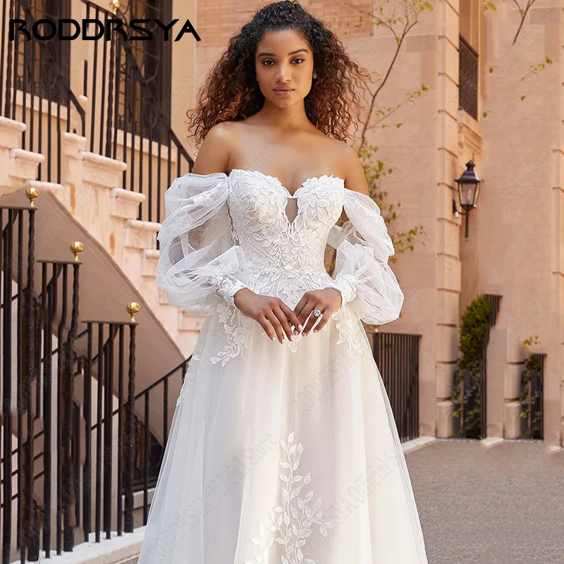 RODDRSYA Vestidos De Casamento De Praia Lace Puff Mangas Vestidos De Noiva Princesa Fora Do Ombro Vestido De Novia Apliques Tulle Sweep Train Praia Vestidos de casamento Lace Puff Mangas Vestidos de noiva Princesa Off