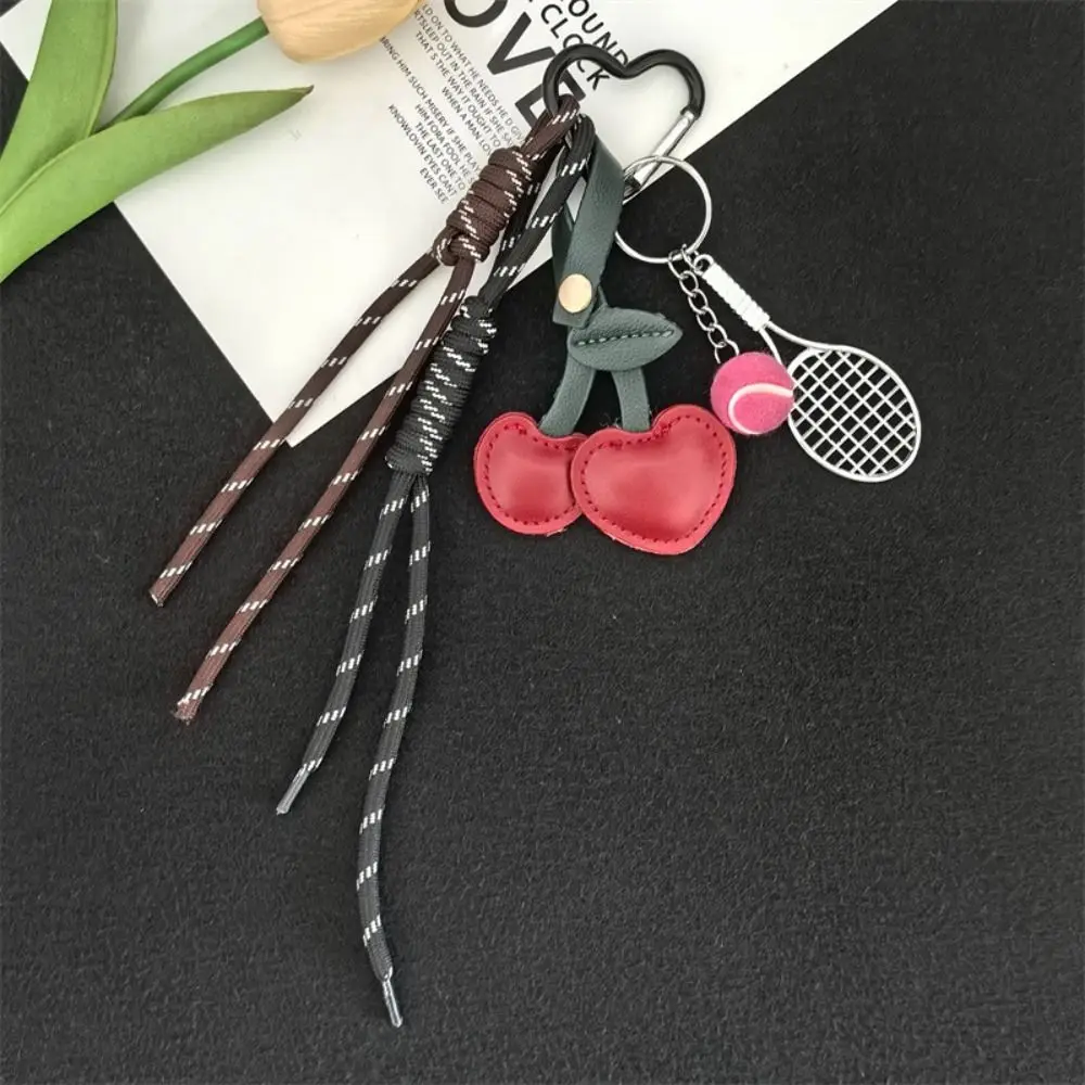 فتاة القلب حبل مضفر المفاتيح المنسوجة يدويا مكافحة خسر الكرز على شكل حقيبة قلادة الجمالية حلية مضرب تنس مفتاح سلسلة