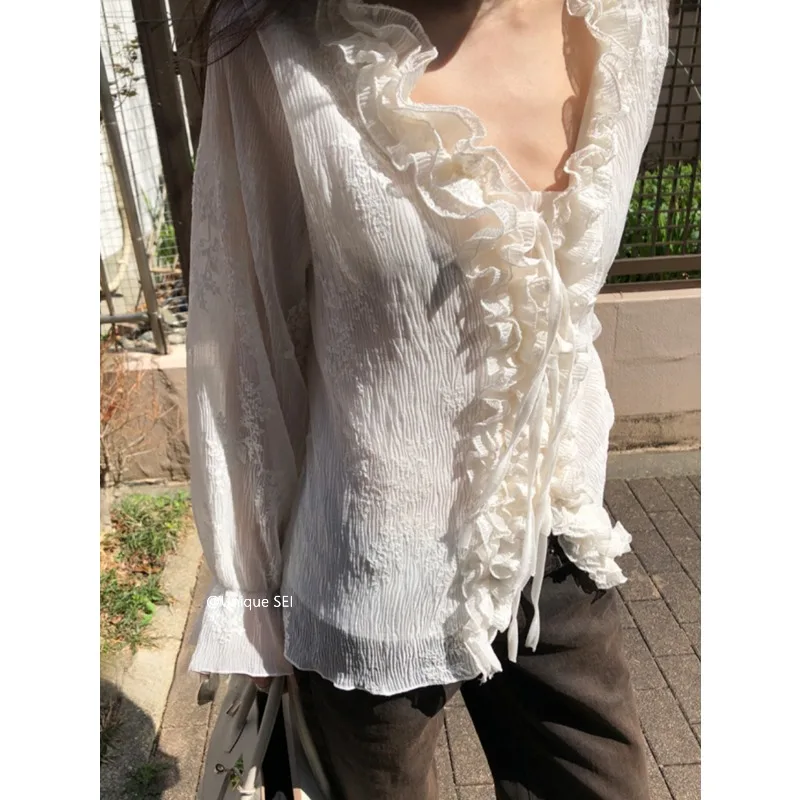 

Korean Style Ruffled Loose Beige Long-sleeved Shirt Women 2026 Summer New V-neck Lace-up Flower Embroidered Casual Tops