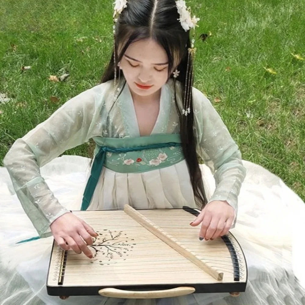 جهاز تدريب تقنية الإصبع الاحترافي Guzheng الصغير المكون من 21 سلسلة، آلات موسيقية متينة صغيرة محمولة من Guzheng