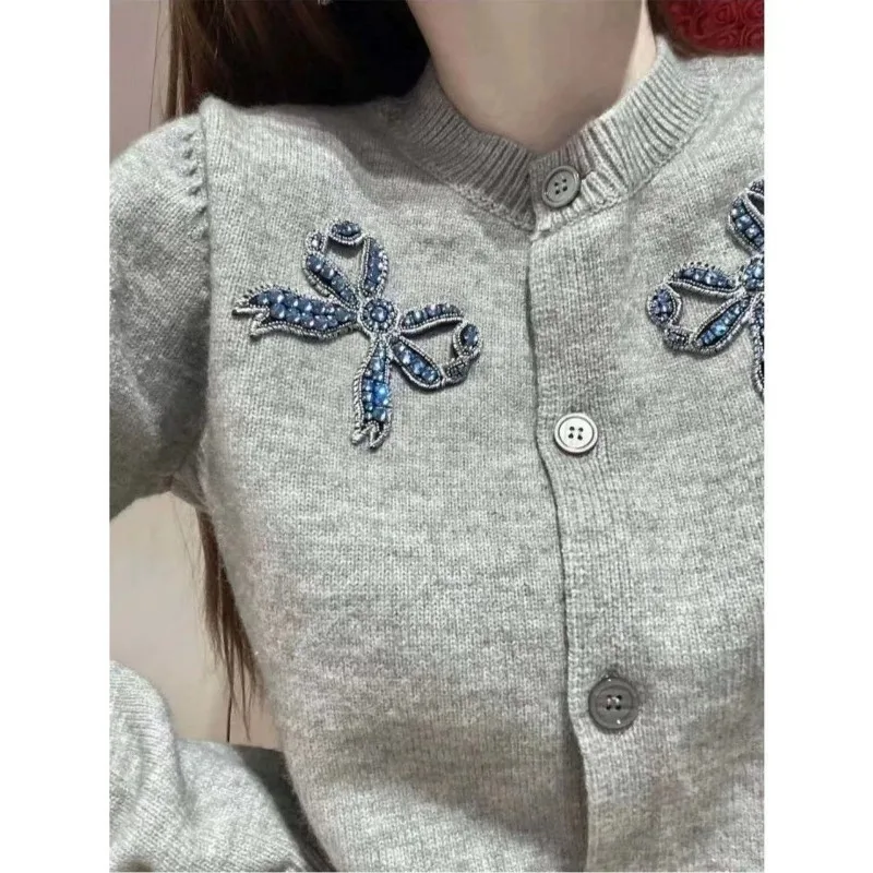 

New Spring Bow-set Diamond-patterned Jacquard Soft and Glutinous Age-reducing Knitted Cardigan Chic and Beautiful Sweater