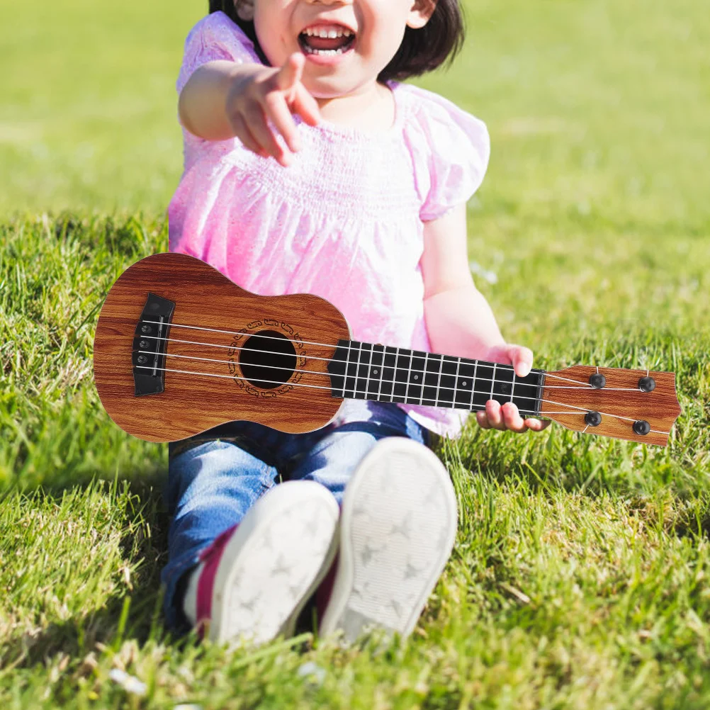 เลียนแบบ Miniature Ukulele ของเล่นเด็ก Ukulele ของเล่นเด็กวัยหัดเดินเครื่องดนตรีของเล่นเด็ก Supply กีตาร์ไม้ของเล่น