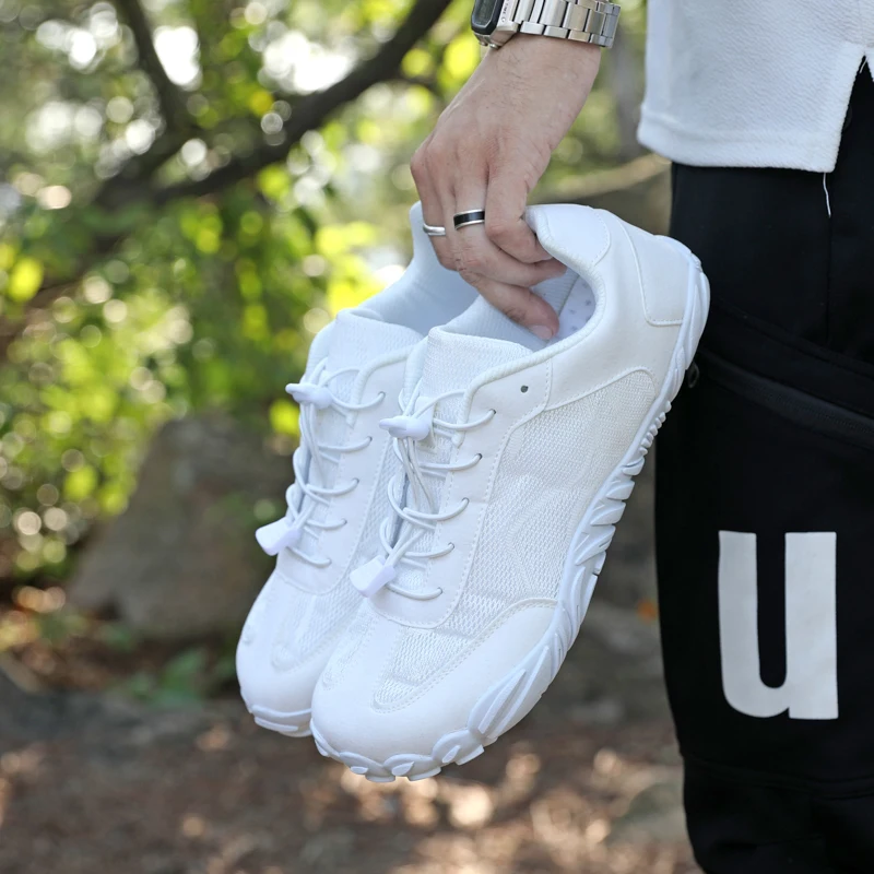 أحذية رياضية كاجوال واسعة من الأمام قابلة للتنفس للرجال والنساء في الهواء الطلق أحذية مشي مضادة للانزلاق للجنسين أحذية تدريب رياضية