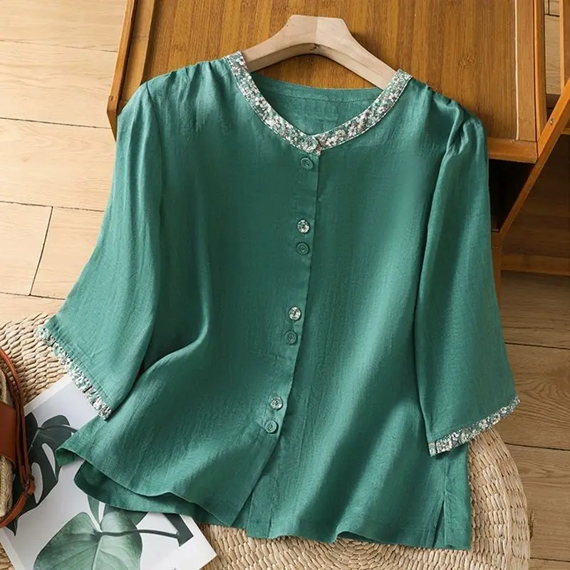 

Women's Teal Green Half Sleeve Blouse Sequined Trim Round Neck Button Front Elegant Casual Top