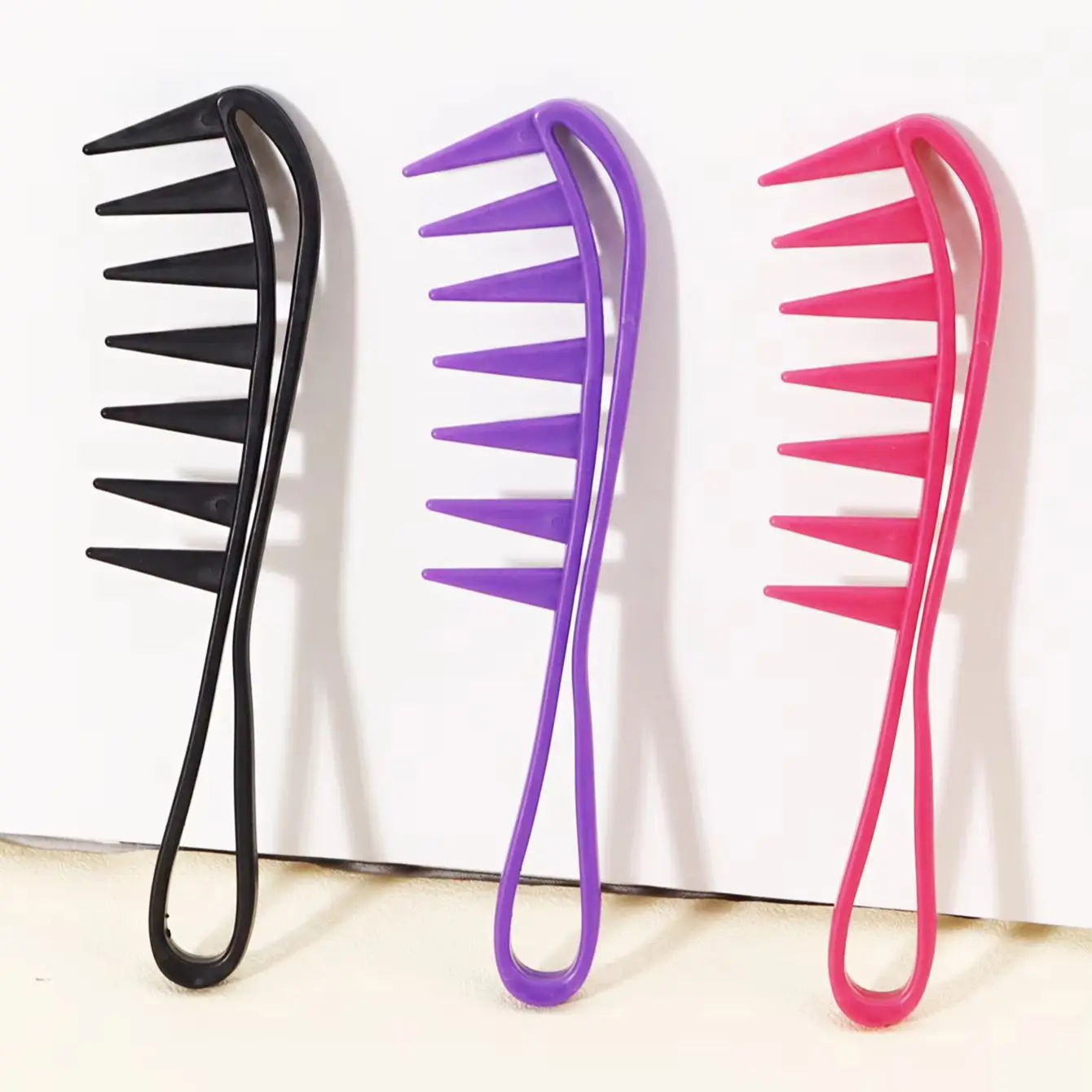 

3pcs multi-color wide toothed hair comb,durable ABS plastic,suitable for dry and wet hair Special for real hair wigs
