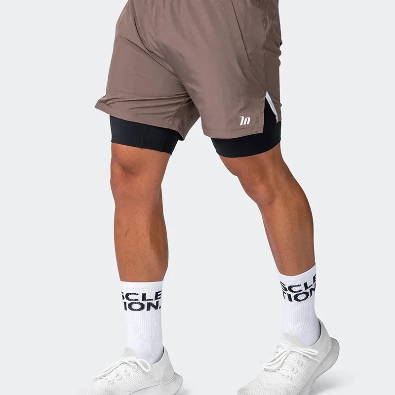 Pantaloncini da uomo 2 In 1 ad alta elasticità pantaloncini da basket con movimento all'aperto nuova estate palestre Fitness Center uomo pantaloncini da allenamento da Jogging