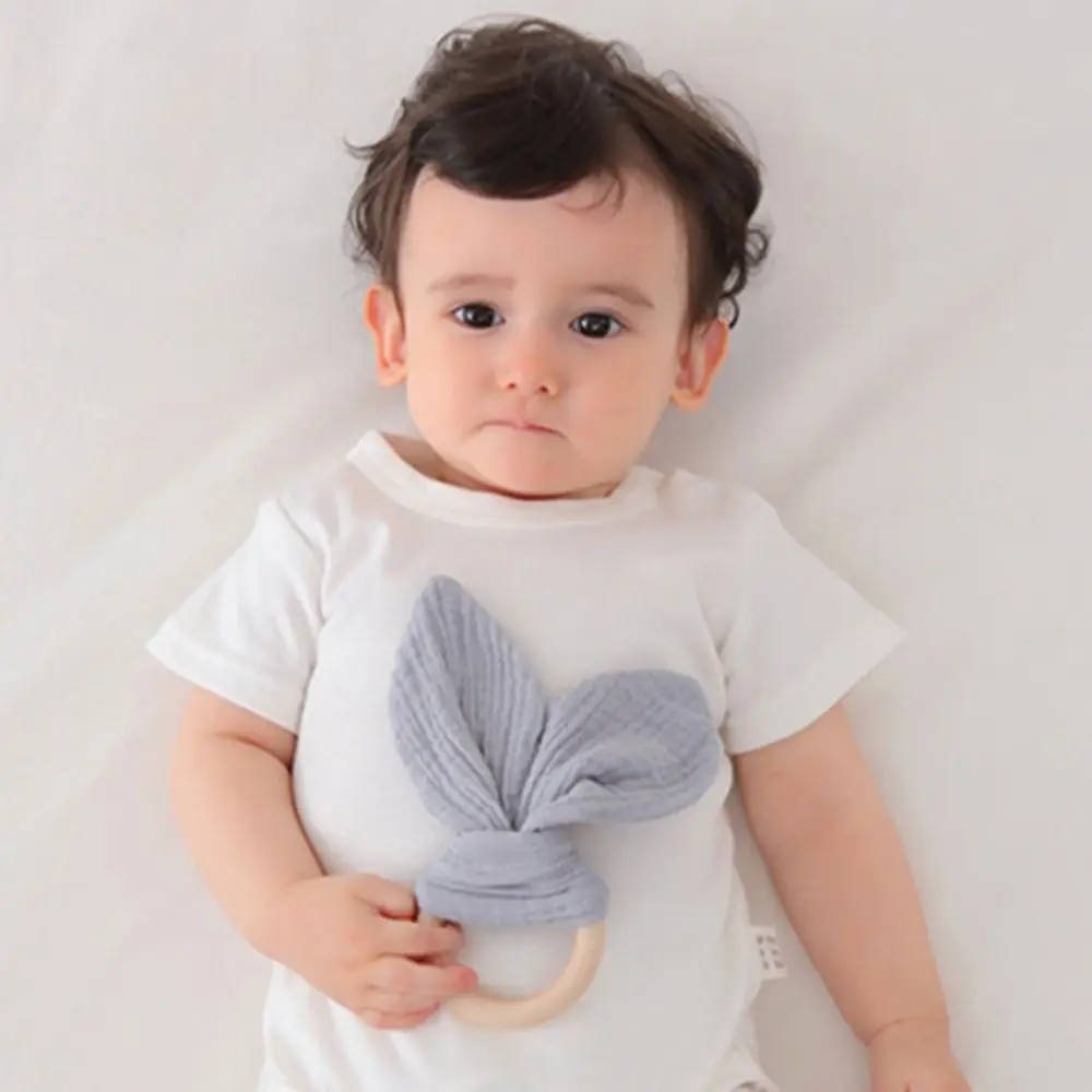 

Soft Baby Wooden Hand Grasp Toy Rabbit Ears Sensory Toy Newborn Teething Ring Natural Wooden Bracelet Rattle Chewing Appease Toy