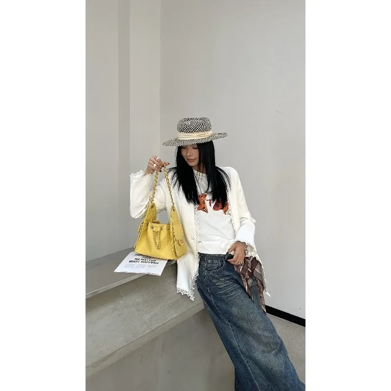 

Niche design sense foreign gas bucket bag women's 2026 new commuter wind rhombus chain shoulder messenger bag