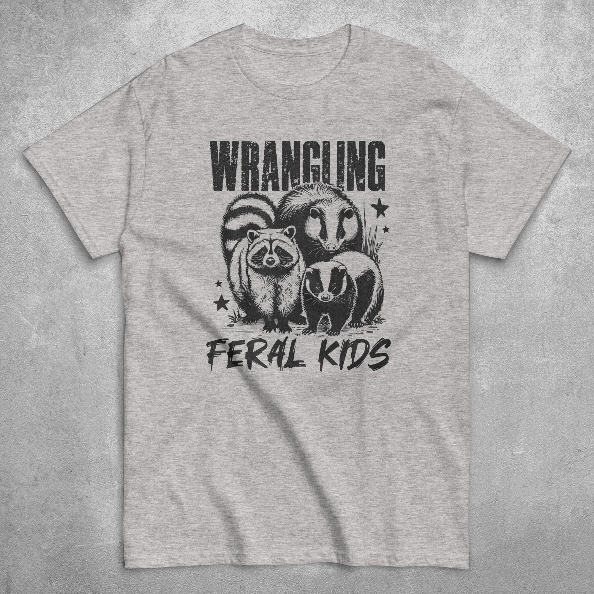 Wrangling Feral Kids T Shirt Funny Raccoon Meme Western Cowboy Style Cute Animal Mom Life Trending Wear