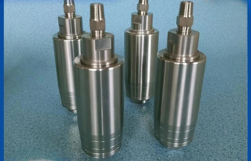 Ultra high pressure rotary nozzle surface cleaning devil nozzle