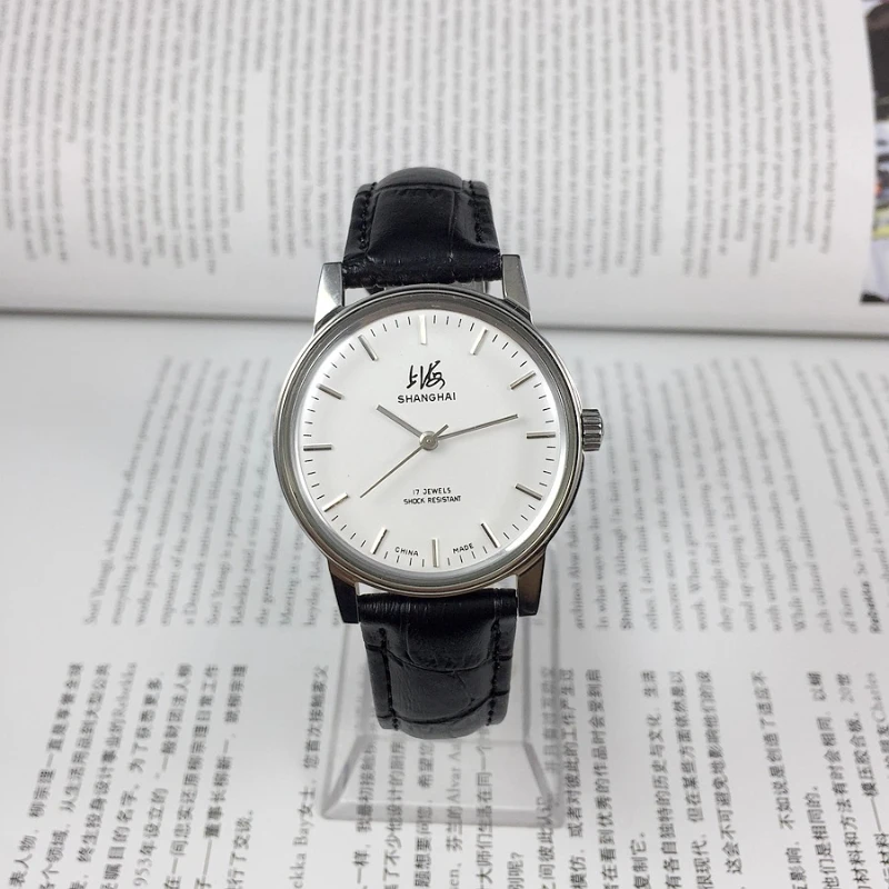 

Shanghai brand 8120 type 17 drill nail white surface manual mechanical watch, diameter 36mm
