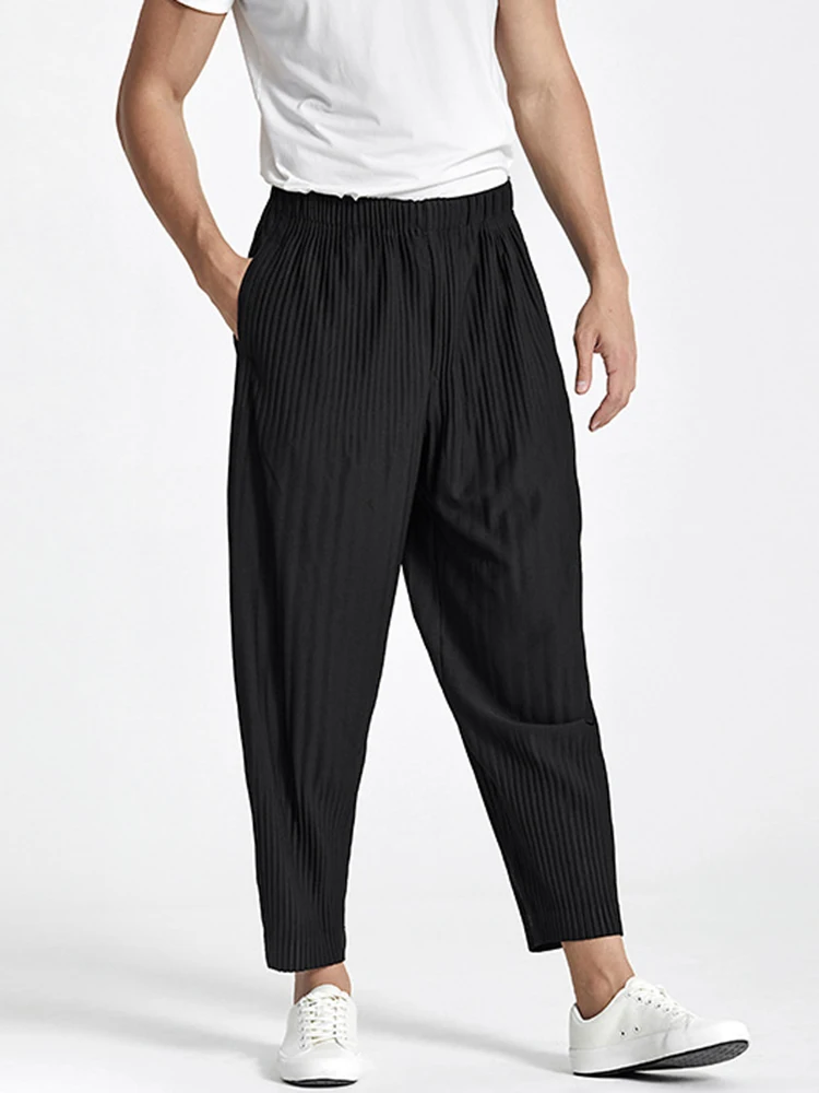 Miyake-pantalones bombachos plisados de Color liso para hombre, pantalón informal, holgado, con bolsillo y cintura elástica, novedad de verano 2025, 2025