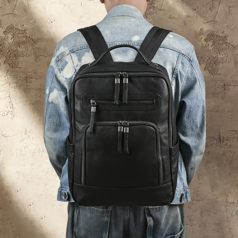 

Genuine leather multi-pocket square double-shoulder men's bag, large-capacity laptop storage, travel hand-held square backpack