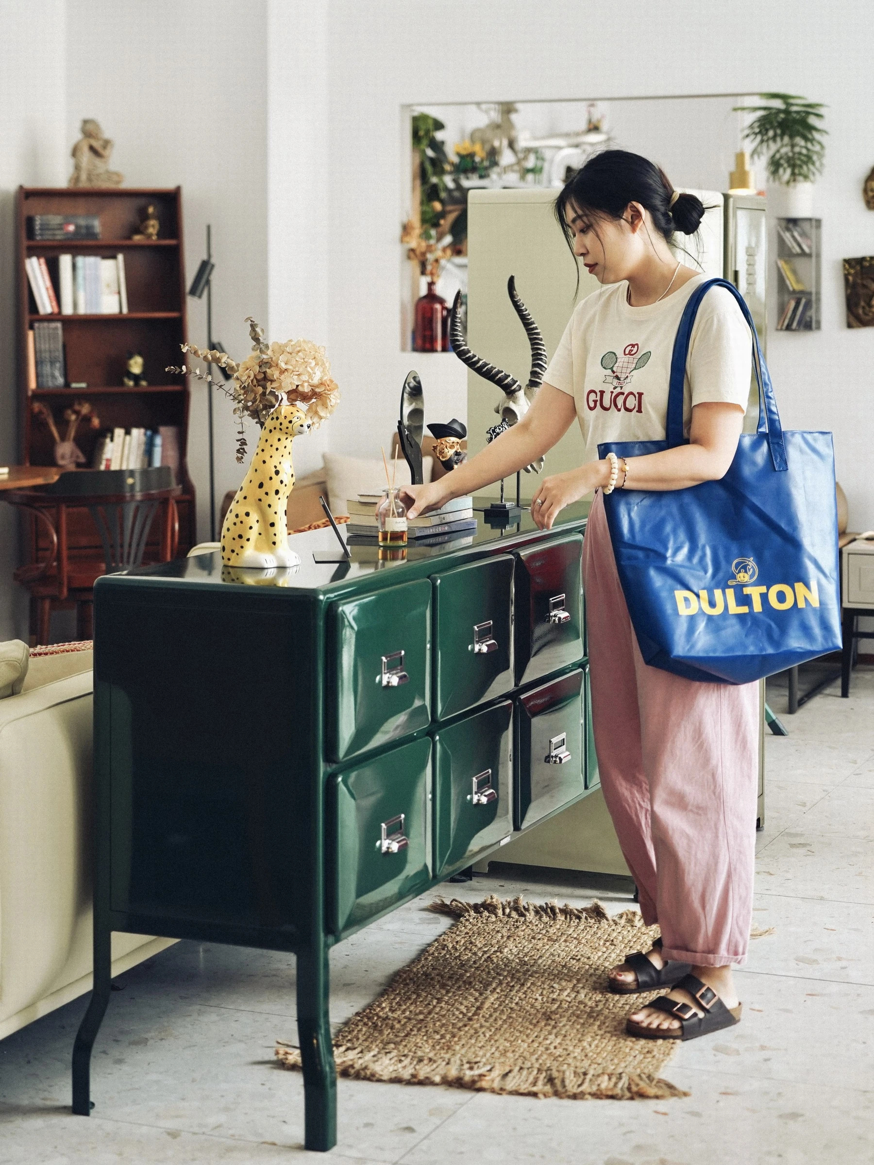 tall eight drawers, multiple rows of metal buckets in the hallway, storage, living room glove cabinet