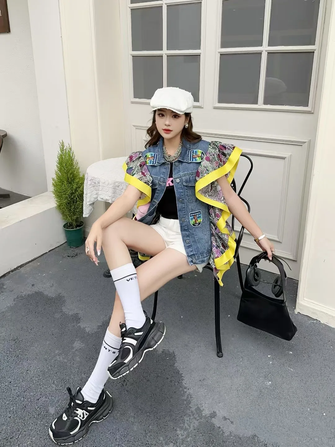 Tide ยี่ห้อ Ruffle Edge Splicing DENIM เสื้อกั๊กผู้หญิงฤดูใบไม้ผลิและฤดูใบไม้ร่วง 2025 ใหม่หลวมเสื้อกั๊กเสื้อแขนกุดสําหรับสตรี