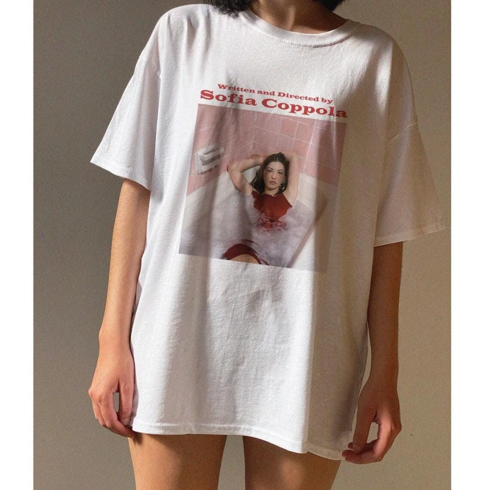 Sofia Coppola wrote and directed a retro-patterned minimalist T-shirt aesthetic. Unisex, all-season streetwear top.