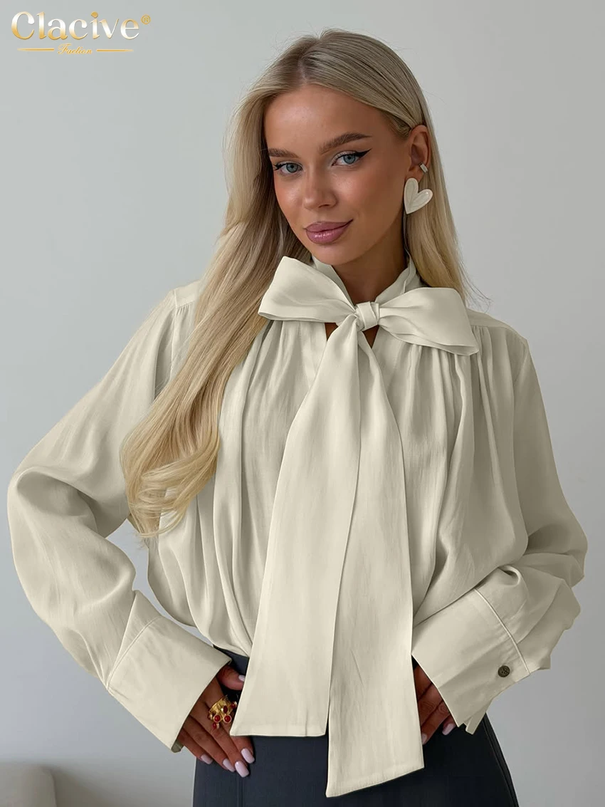 

Clacive Fashion Loose Beige Women Shirt 2026 Autumn Bow Collar Long Sleeve Lady Shirts Elegant Classic Solid Top Female Clothing