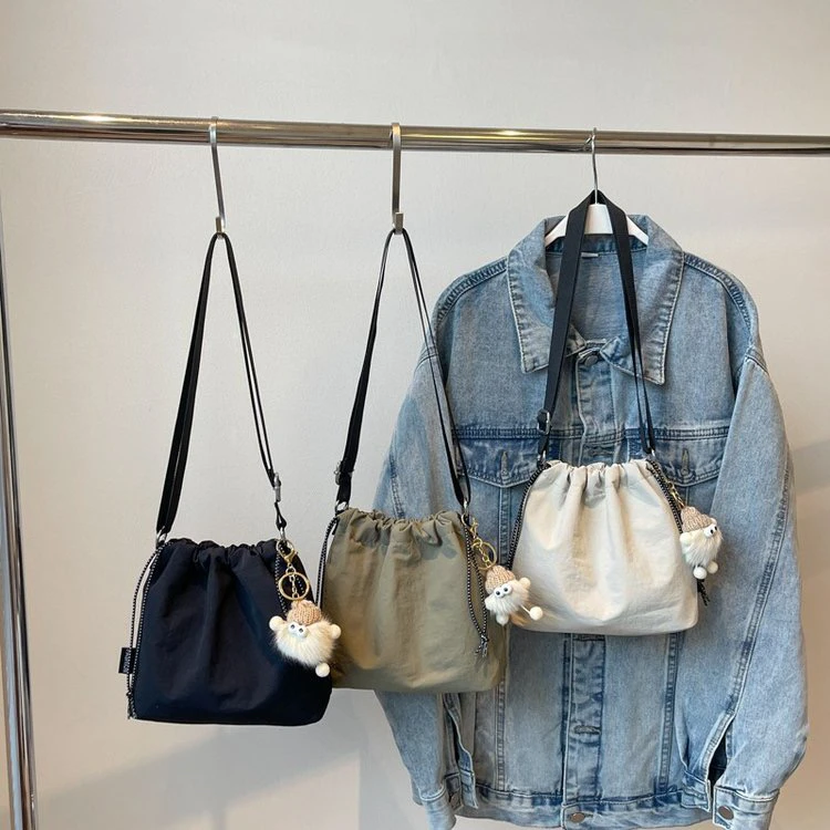 حقيبة دلو عصرية من النايلون للنساء، حقيبة كتف واحدة للطلاب، نمط كاجوال، قماش أكسفورد ناعم قابل للغسل