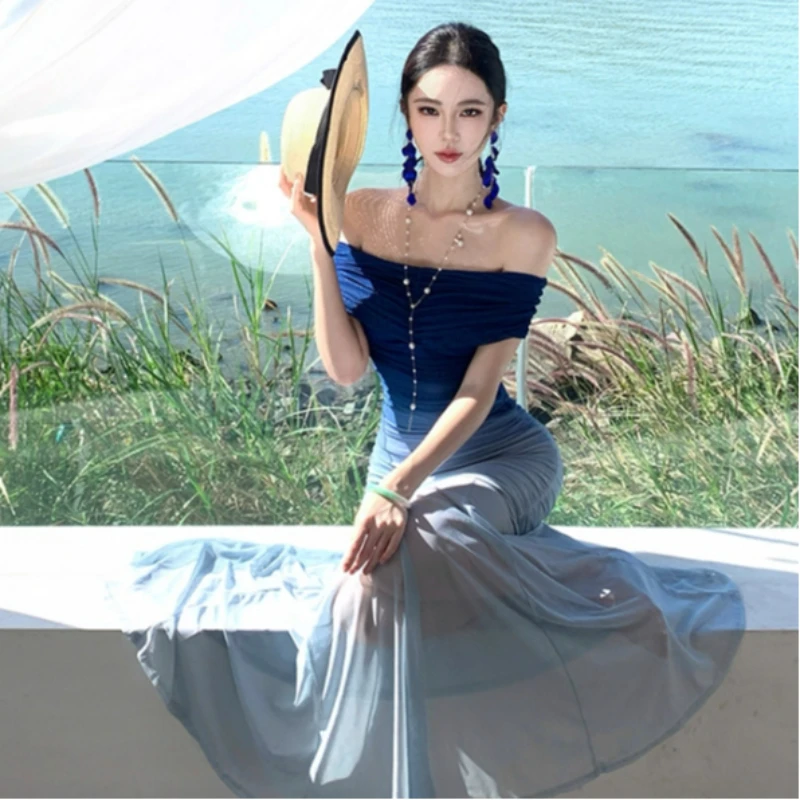 

In The Summer of 2026 Featuring Seaside and Beach Vacation Style Long Skirt Trendy and Sensual Gradient Blue Dress for Women