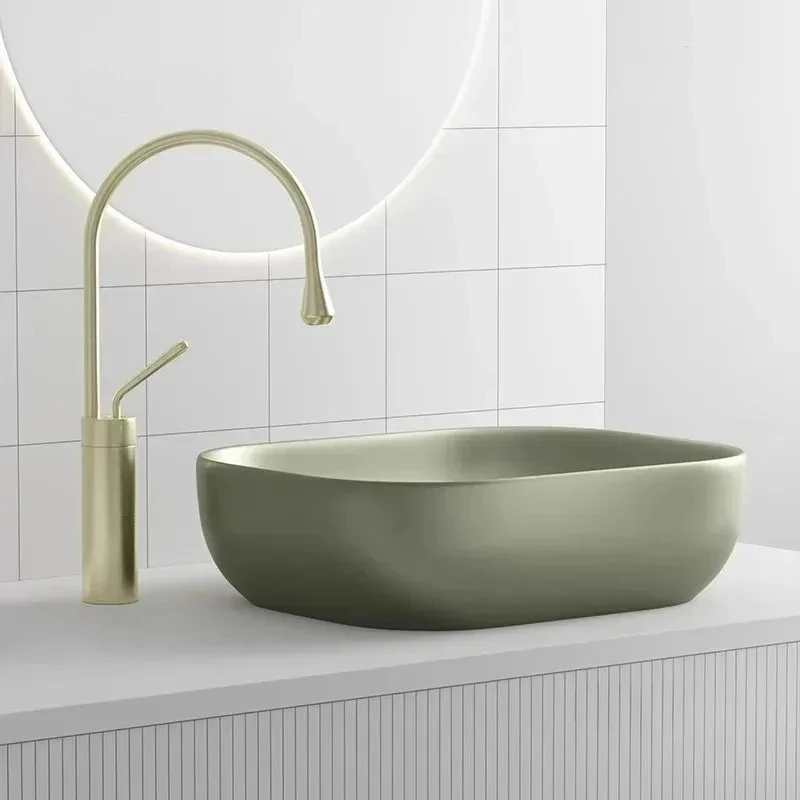 

Simple Ceramic Sinks for Toilets Nordic High-end Deep Above-the-counter Basin Luxury Oval Designer Bathroom Sink for Balcony