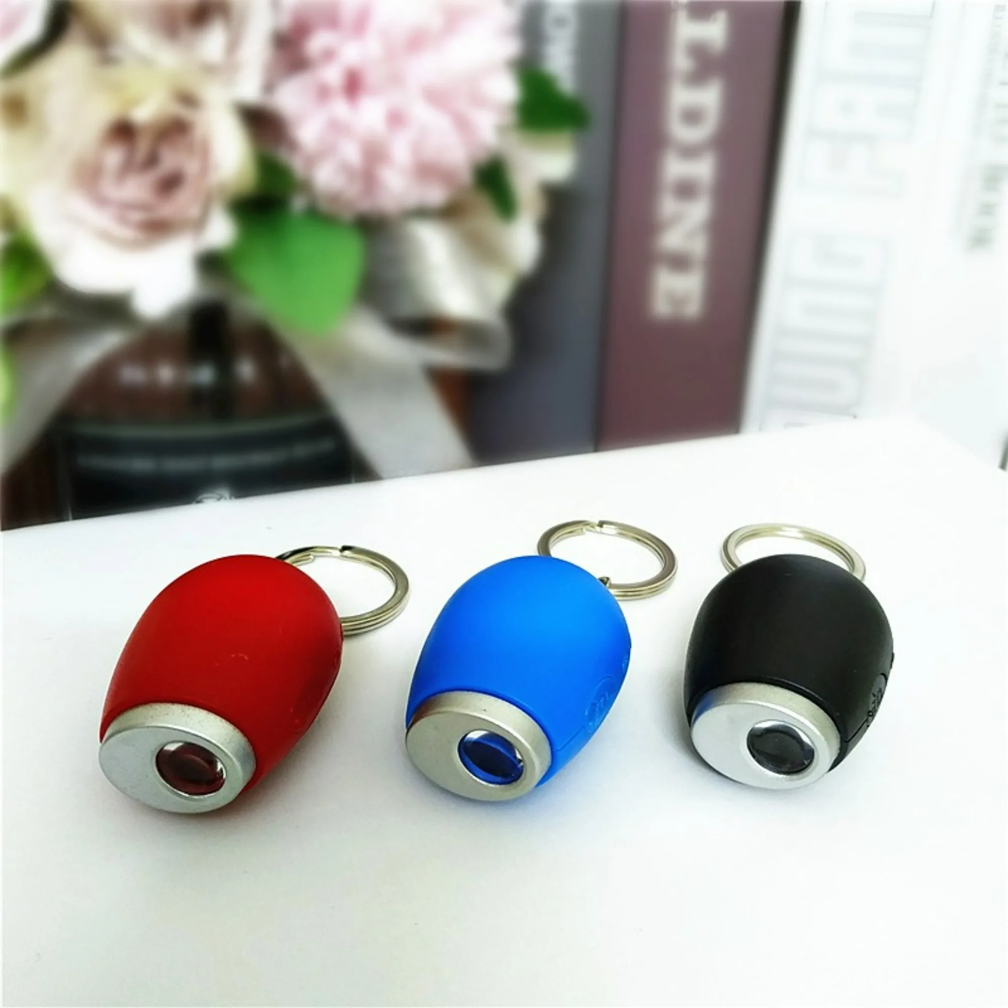 Mini Keychain Projection Clock Portable LED Digital Display Oval Plastic Alarm Clock for Traveling Business Trips