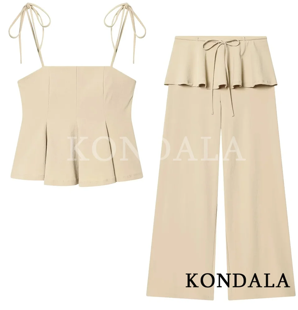 

Комплект KONDALA: Модный женский топ без рукавов на шнуровке и многослойные брюки с эффектом драпировки. Новая коллекция Весна-Лето 2026. Праздничный комплект.