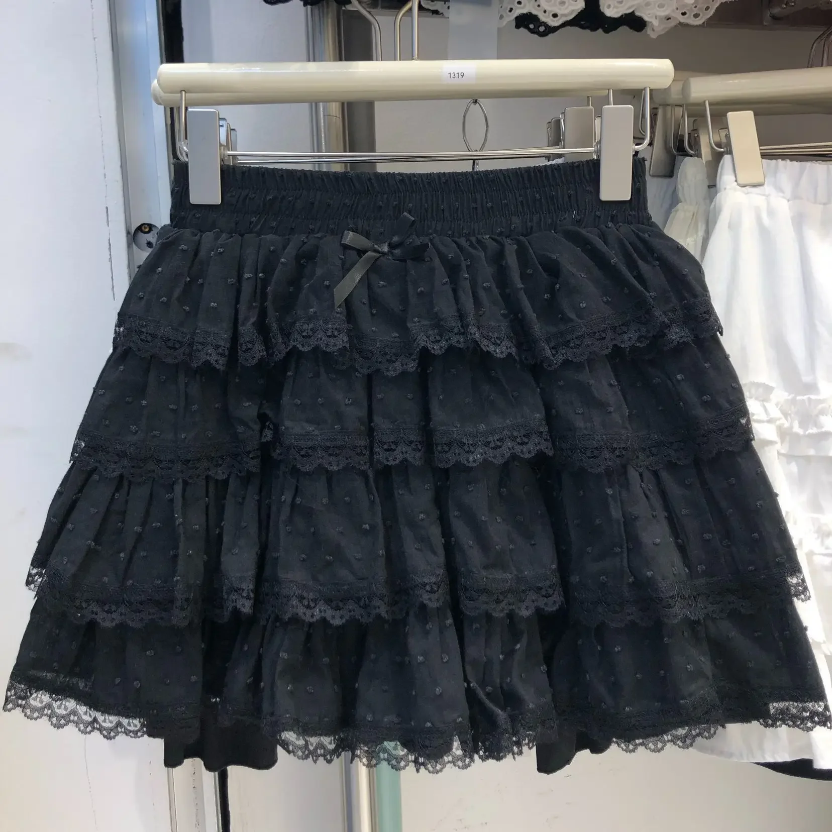 جديد فراشة عقدة الأبيض تنورة قصيرة عالية الخصر ألف خط كعكة تنورة المرأة النقي التطريز المضادة للضوء الطبقات نصف تنورة