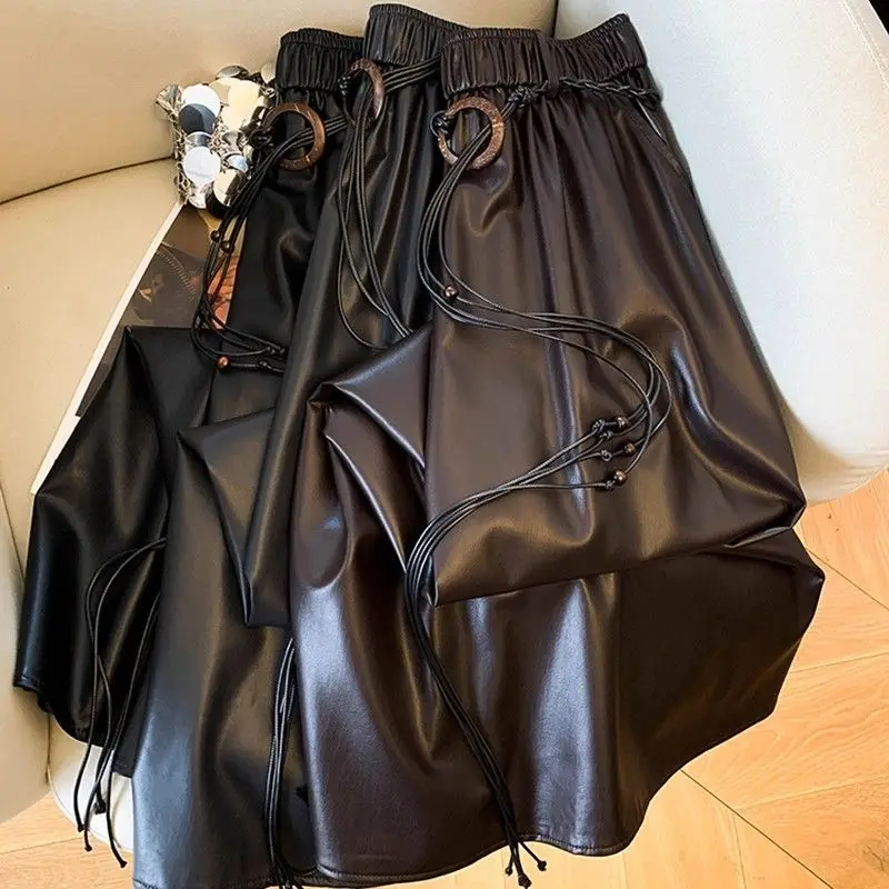 

2025 autumn new PU leather skirt skirt with belt women wear high waist thin versatile loose a word long skirt