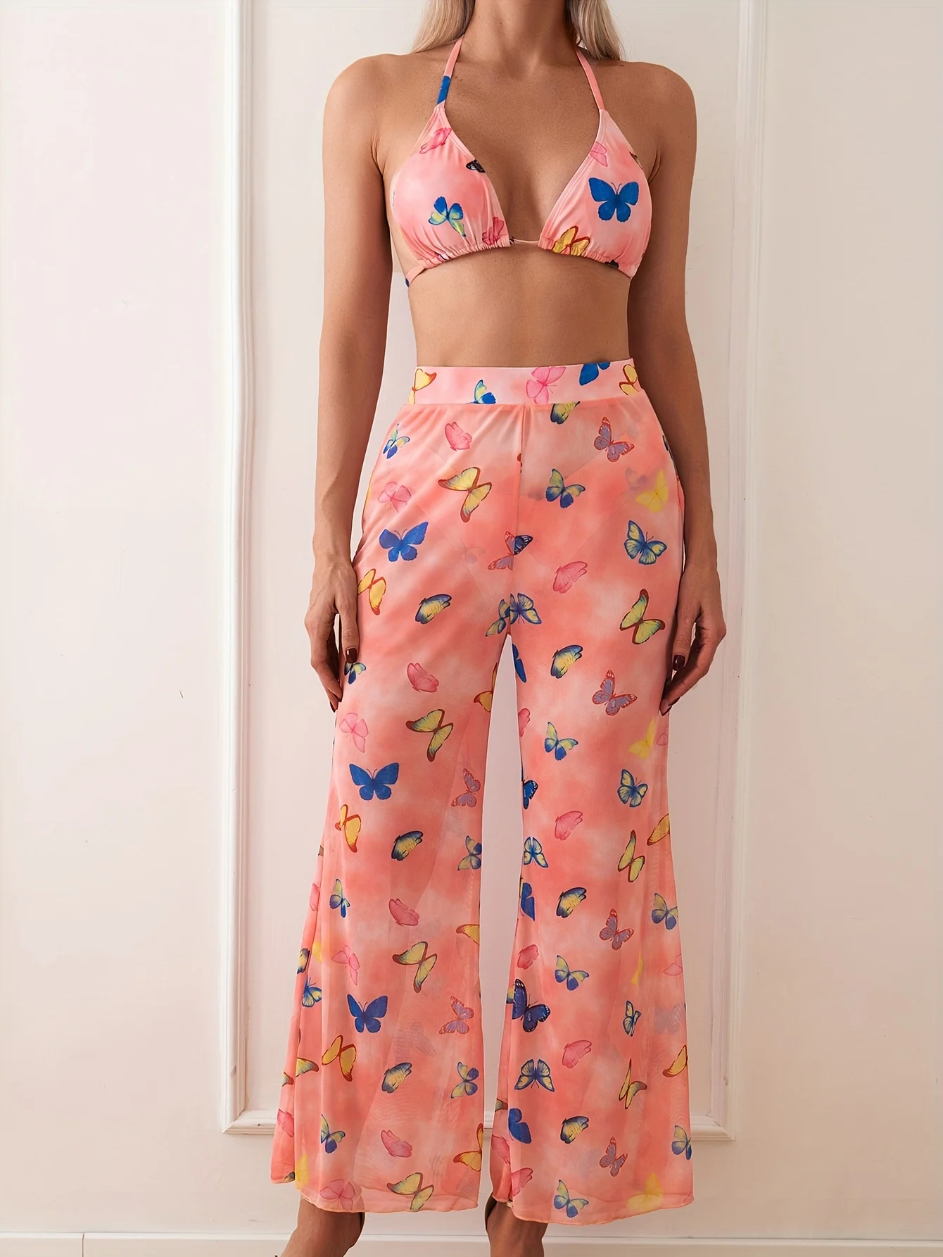 

Women's sexy V-neck three-piece bikini set with long pants for sun protection. Featuring butterfly print. Ideal for beachwear.