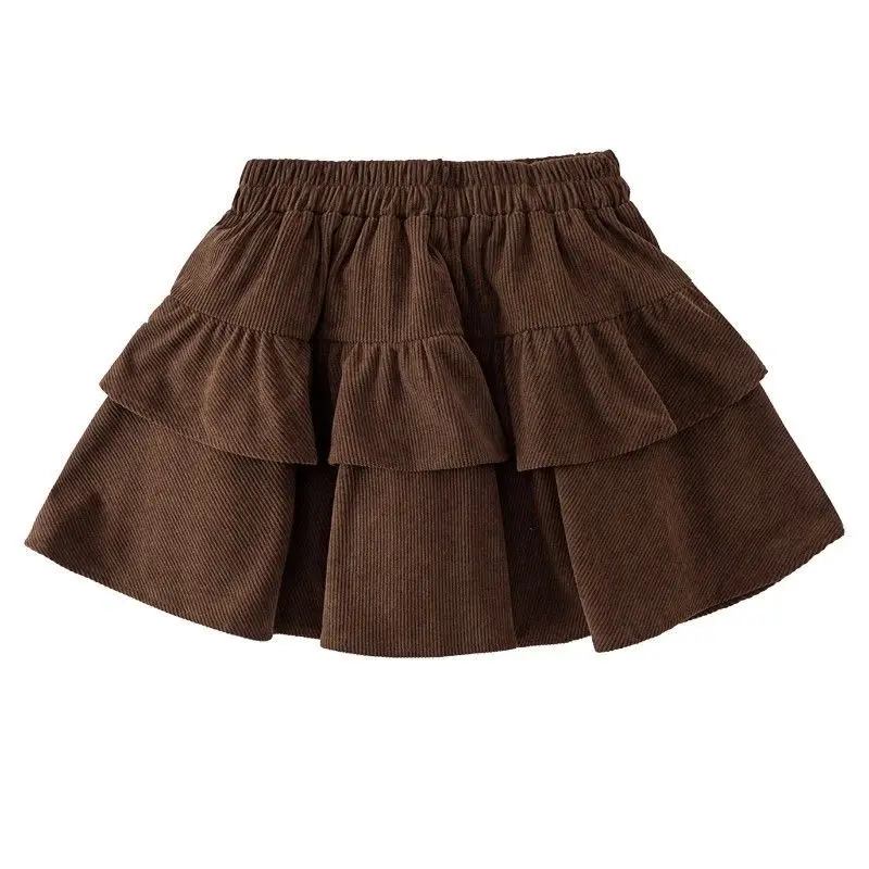 تنورة قصيرة جديدة لخريف وشتاء 2025 للفتيات تنورة كعكة عصرية للأطفال تنورة مطوية مع سراويل أمان