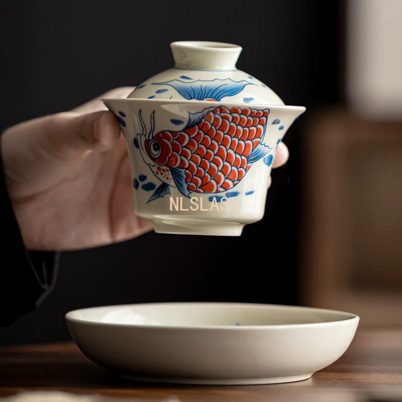 طقم شاي صيني طقم شاي سيراميك منزلي وعاء مغطى بالأسماك الذهبية أدوات شرب المطبخ سيراميك كونغ فو ، طقم شاي Pu Erh