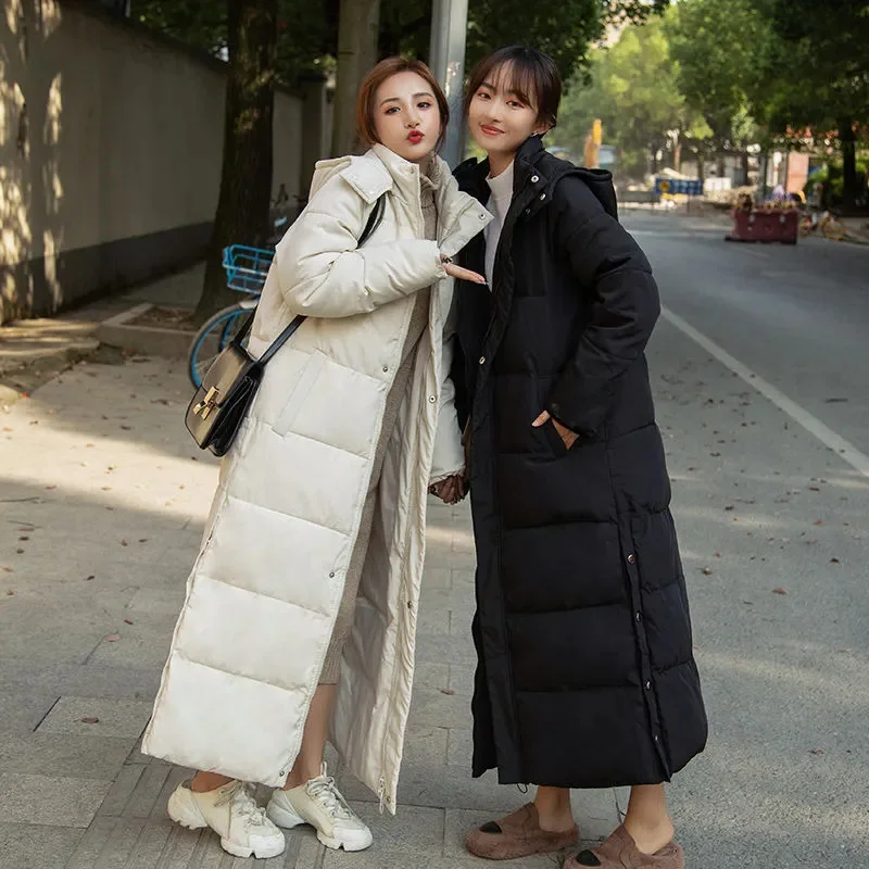 Chaqueta de plumón de algodón para mujer, abrigo largo grueso, suelto y versátil, Extra largo hasta la rodilla, novedad de invierno, 2024