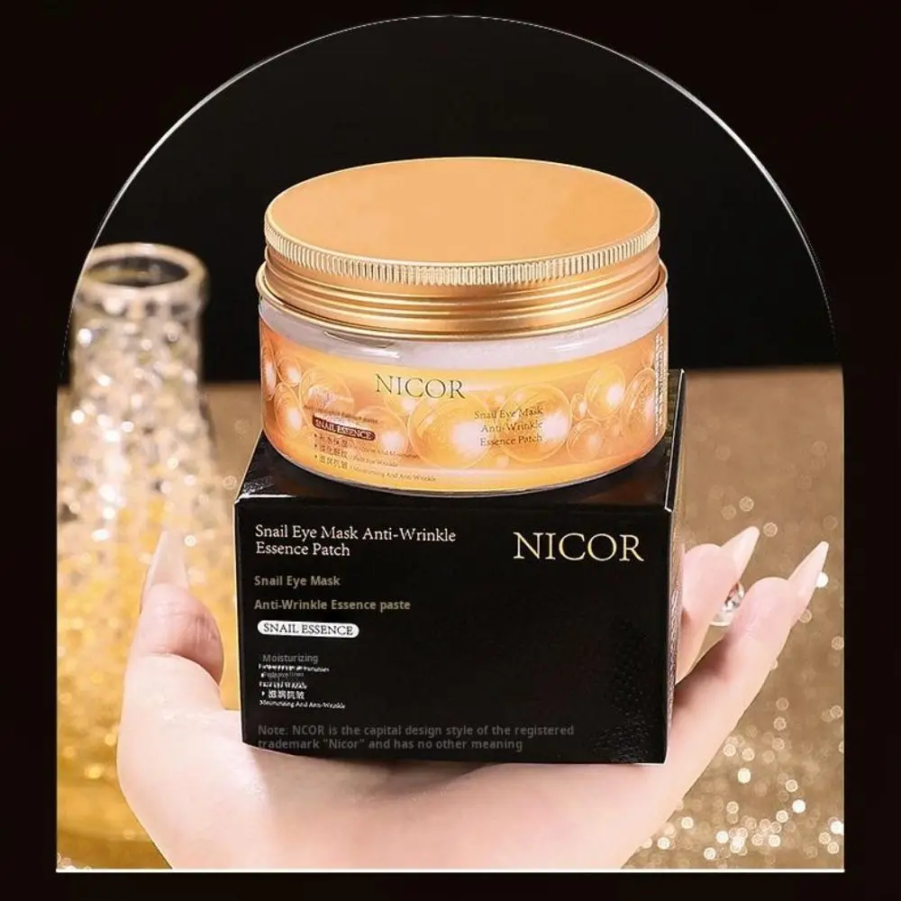 40 Uds nueva mascarilla hidratante para ojos de Caracol reafirmante Reduce las líneas finas parches para los ojos antiojeras máscaras para los ojos cuidado diario