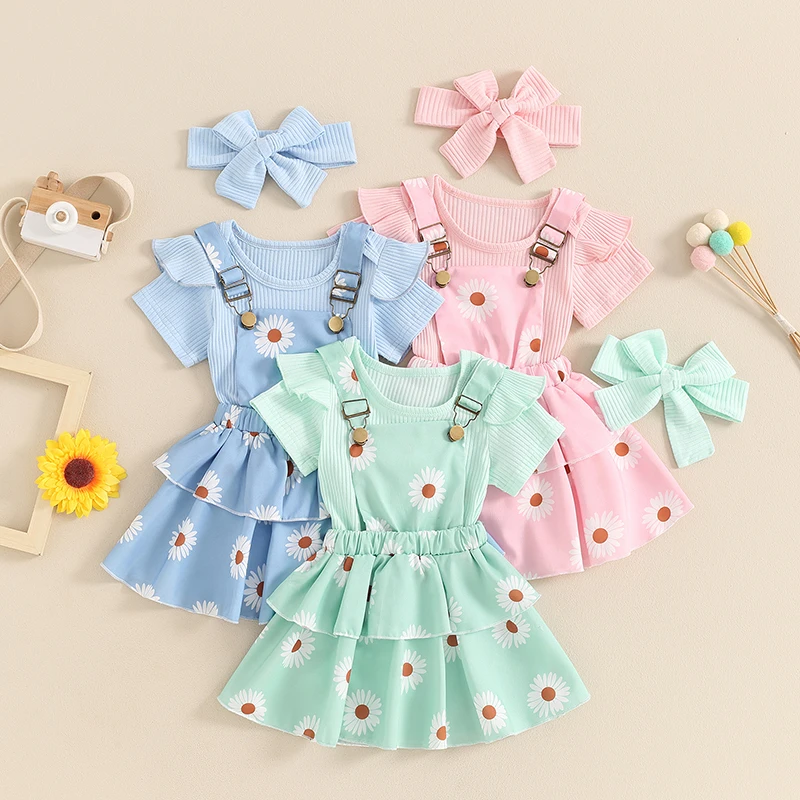 

2024-04-09 Lioraitiin 0-18M Summer Infant Baby Girls Outfits Short Sleeve Ribbed Romper + Suspender Skirt + Headband Set Clothes