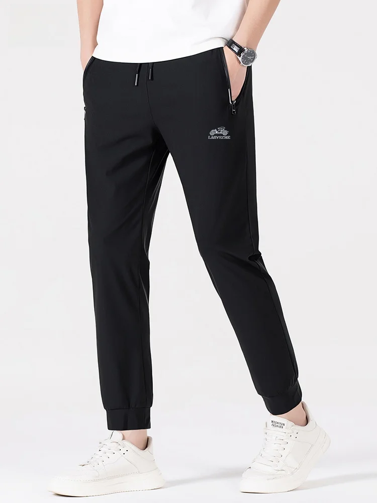 

Мужские летние спортивные брюки из высококачественного ледяного шелка свободного кроя, быстросохнущие, немнущиеся, модные повседневные брюки от Laoyeche