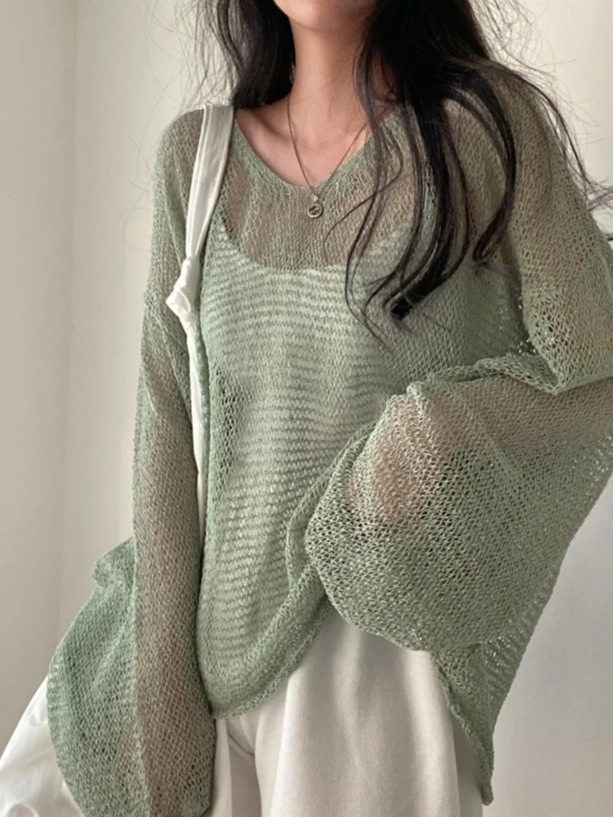 

Korean Sle Uneven Knitted Hollow out Top Women's Spring Thin Casual Loose Lazy Sle Semi-Transparent Long Sve irt