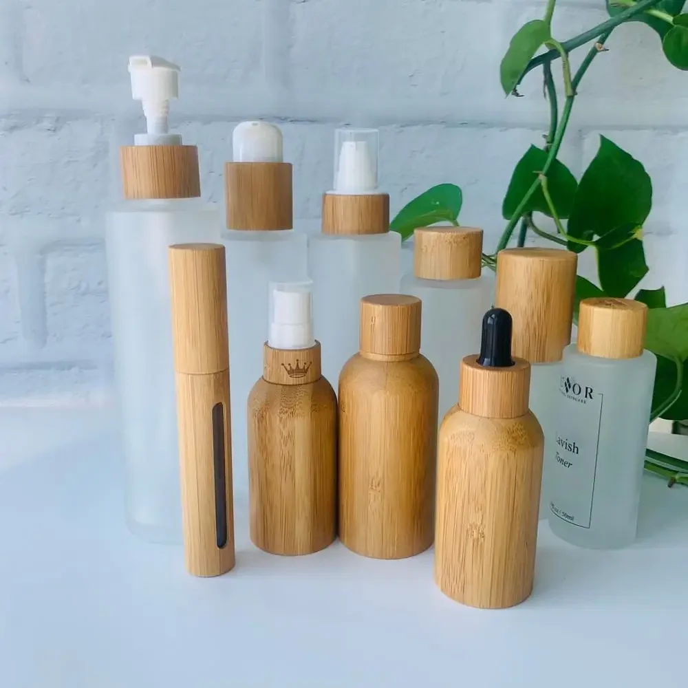 

whosesale travel tools Bamboo wood covered with spray cap lotion pump cap shampoo cap frosted glass Bottles jars for cosmetics