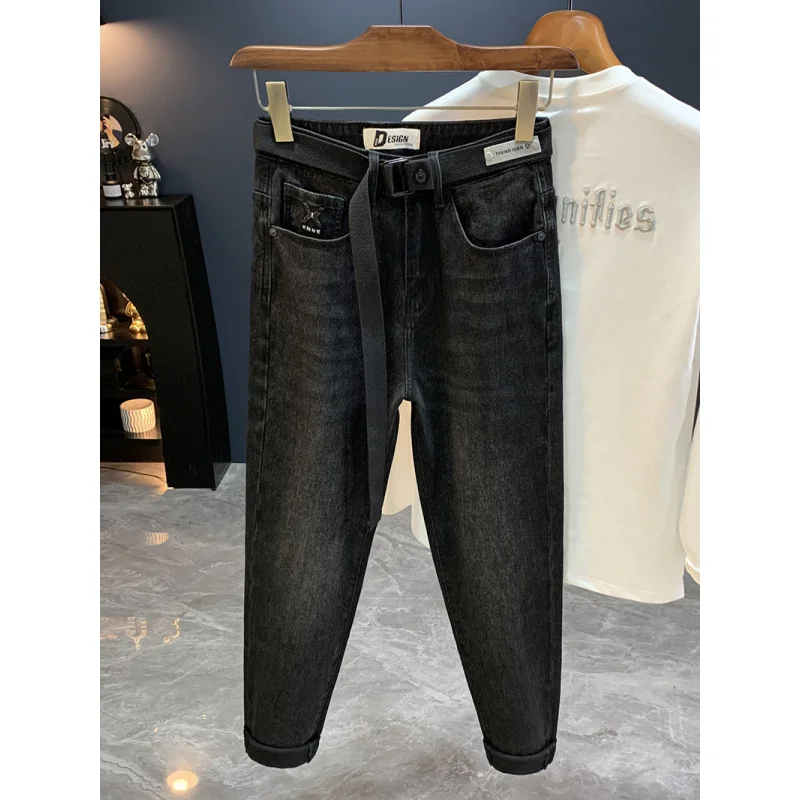 جينز أسود للرجال 2025 خريف جديد ملابس للرجال الراقية العلامة التجارية العصرية القدم الصغيرة عادية مطاطا بنطال ملاصق للجسم