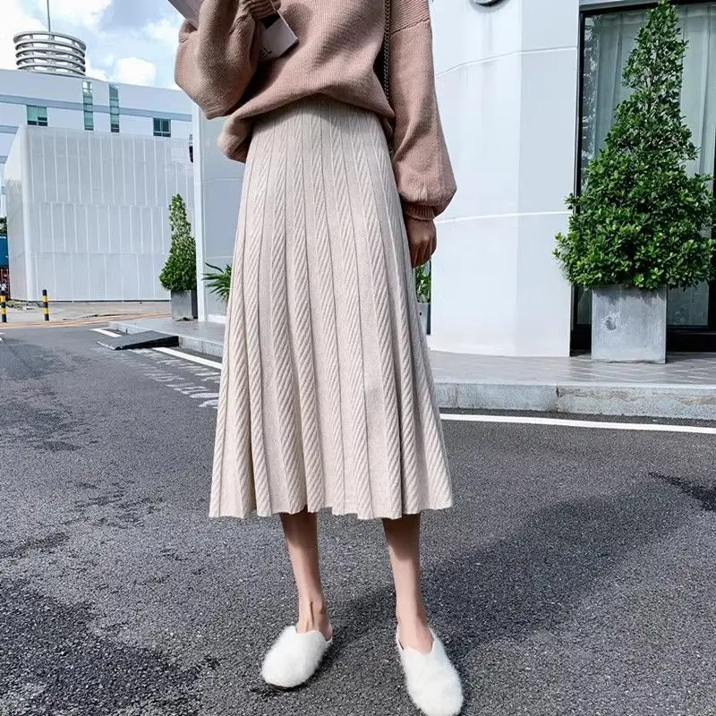 Knitted hip wrap skirt for women's autumn and winter new mid length high waisted slimming versatile A-line pleated skirt