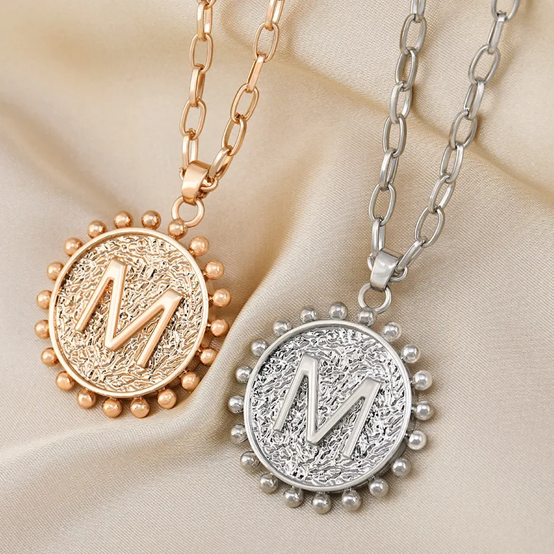 

A fashionable and elegant double-sided M&B literal sweater chain necklace for autumn and winter