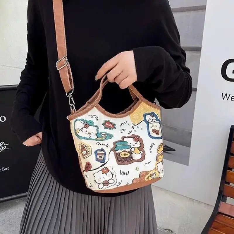 

Холщовая сумка Sanrio для девочек с героями мультфильмов, женская сумка Hello Kitty Kawaii, большая вместительная сумка на плечо, портативный портативный рюкзак Dopamine, новинка